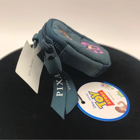 SOLD……..NWT Vera Bradley Disney Pixar Toy Story Andy’s Room Bag Charm - Picture 3 of 8